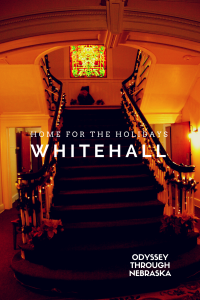 Lincoln's Whitehall Mansion's grand staircase at Christmastime